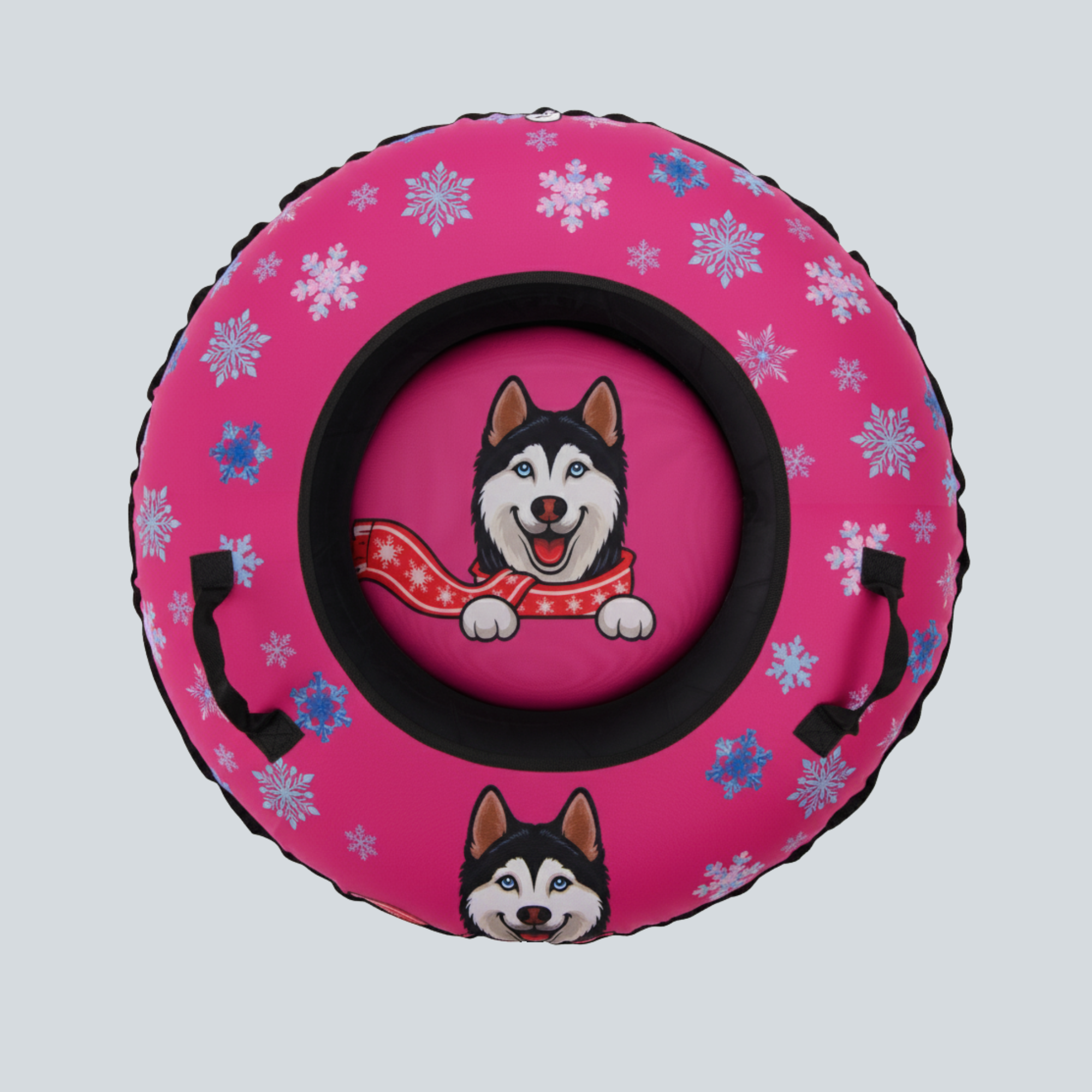 Pink inner tube with cartoon dog and snowflake pattern on a light gray background