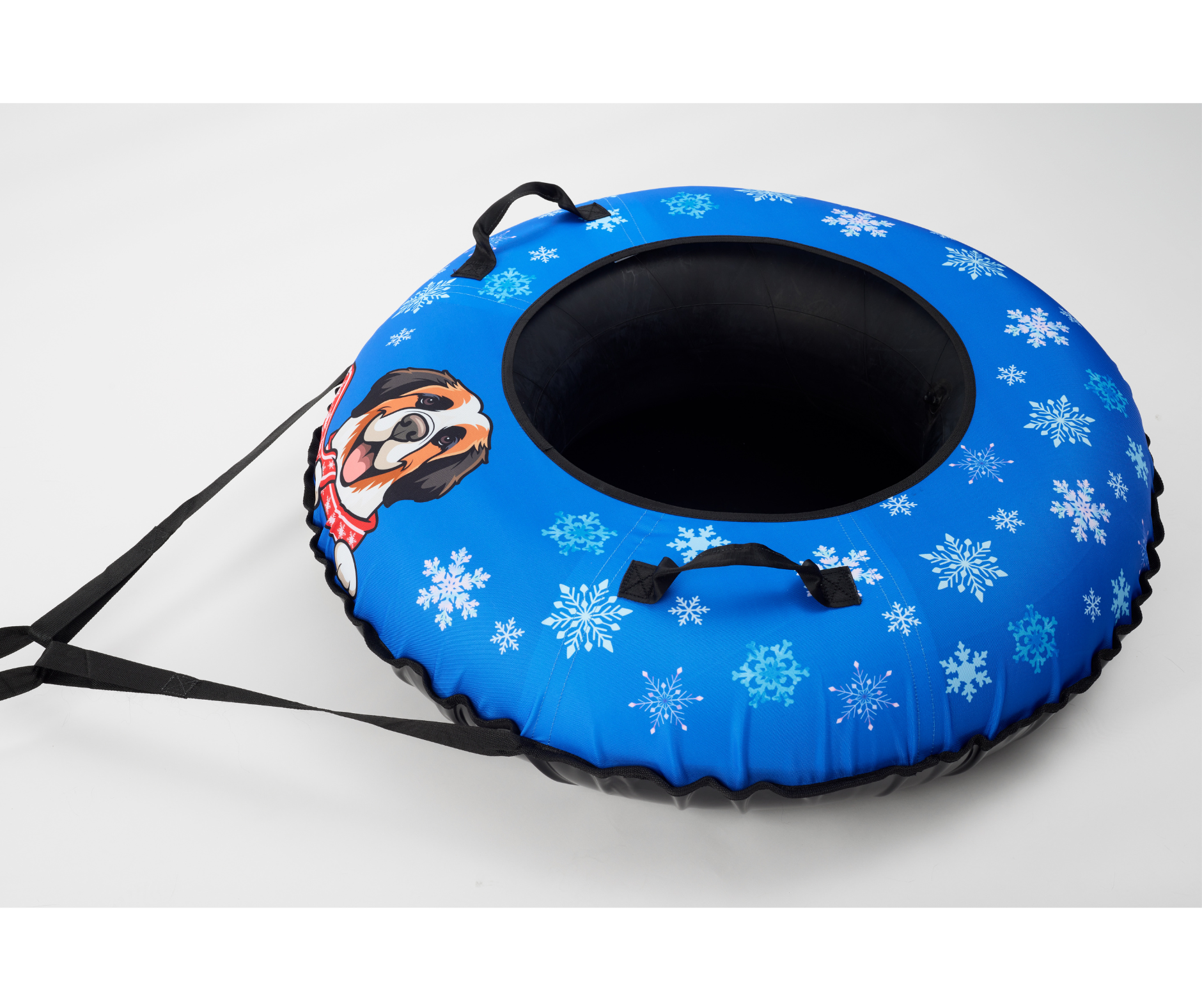 Blue snow tube with snowflake pattern and dog face design on a white background