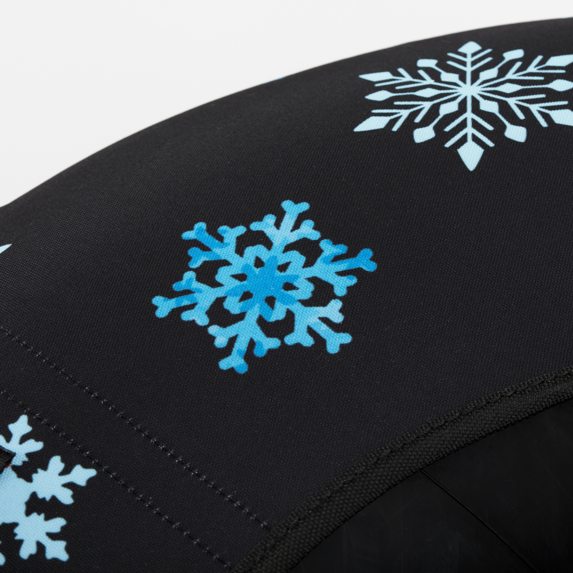 Black surface with blue snowflake patterns