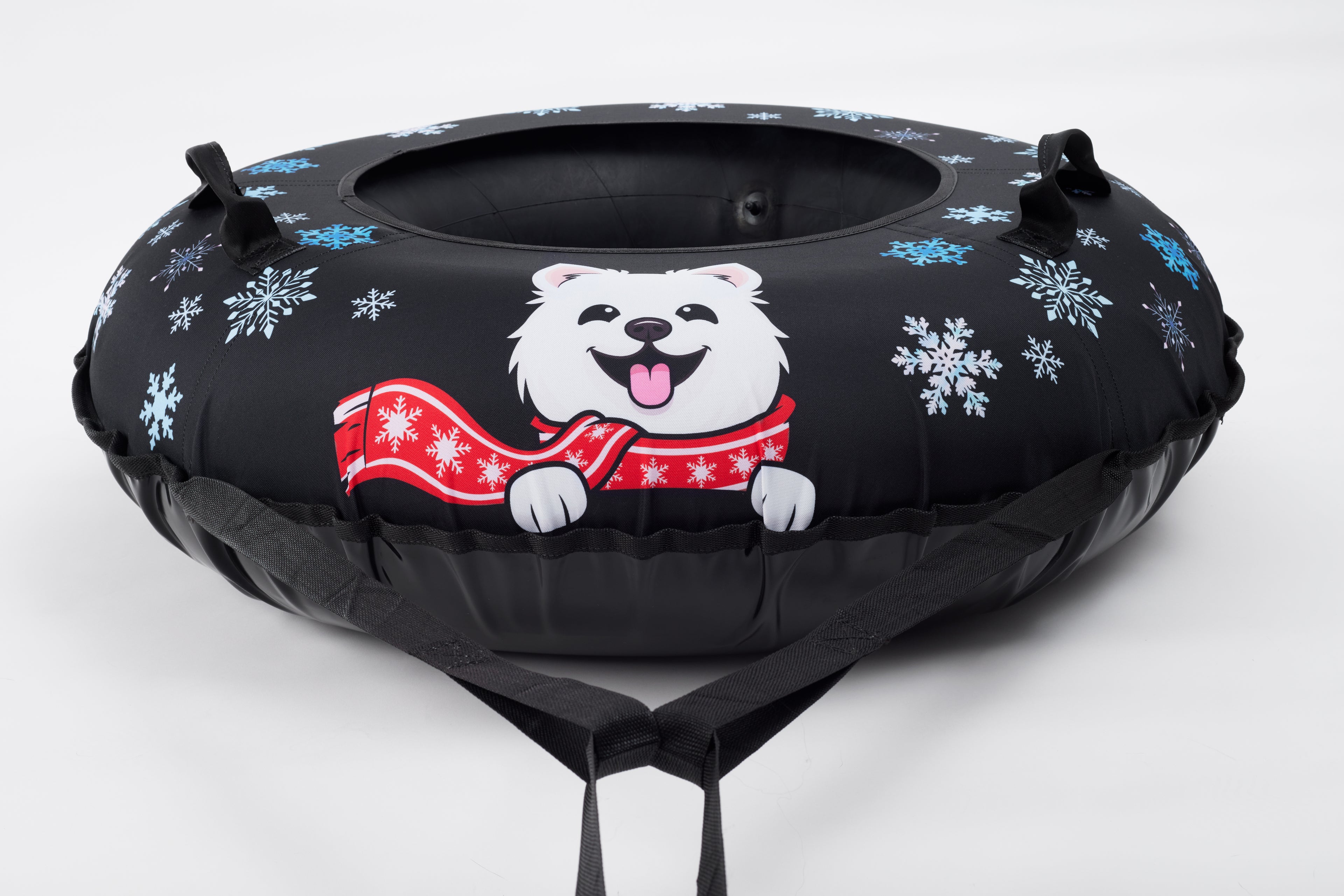 Inflatable tube with a dog design and snowflake patterns on a white background