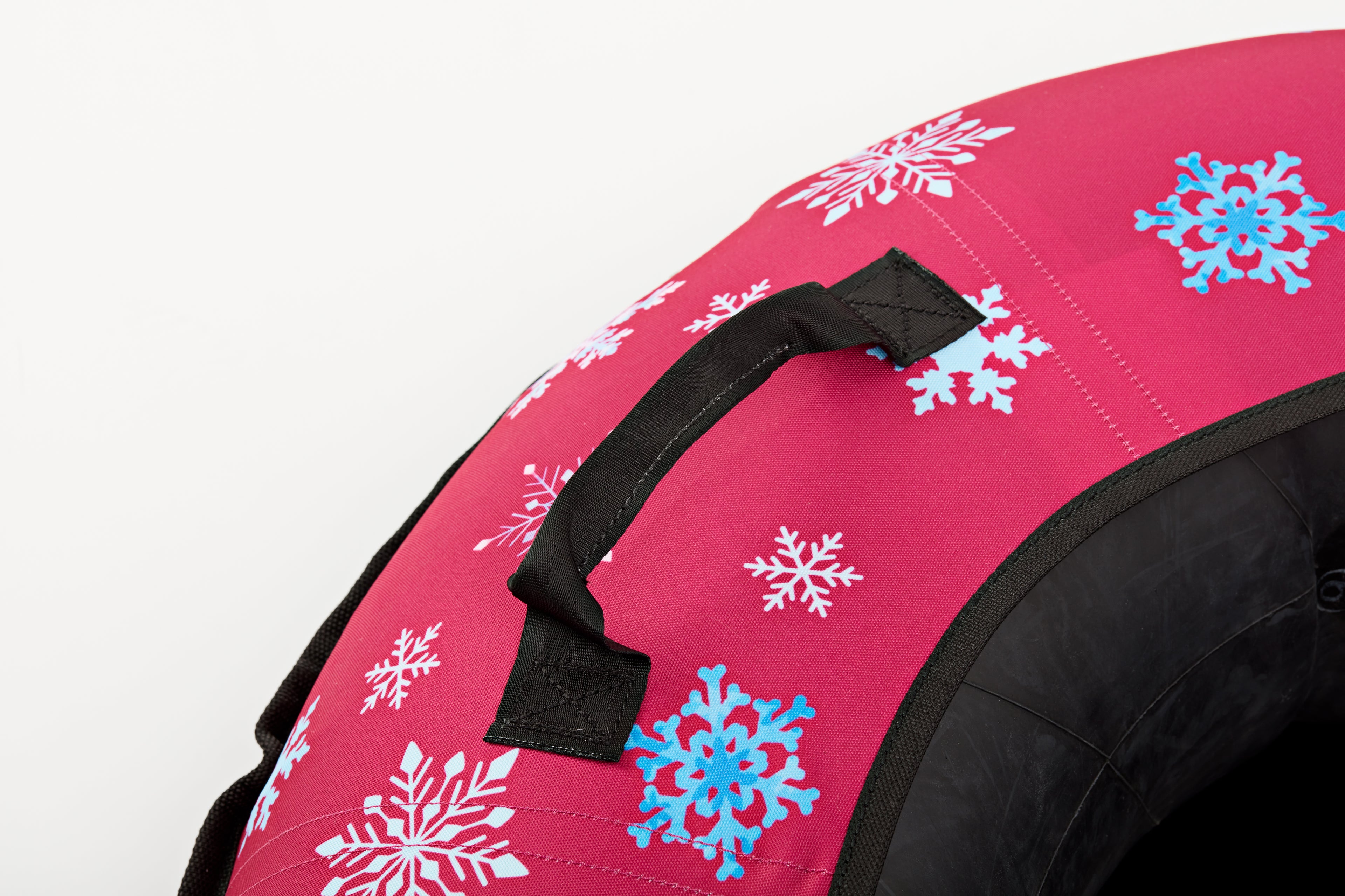 Pink bag with snowflake patterns on a white background