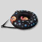 Black neck pillow with cartoon characters and snowflake patterns on a gray background
